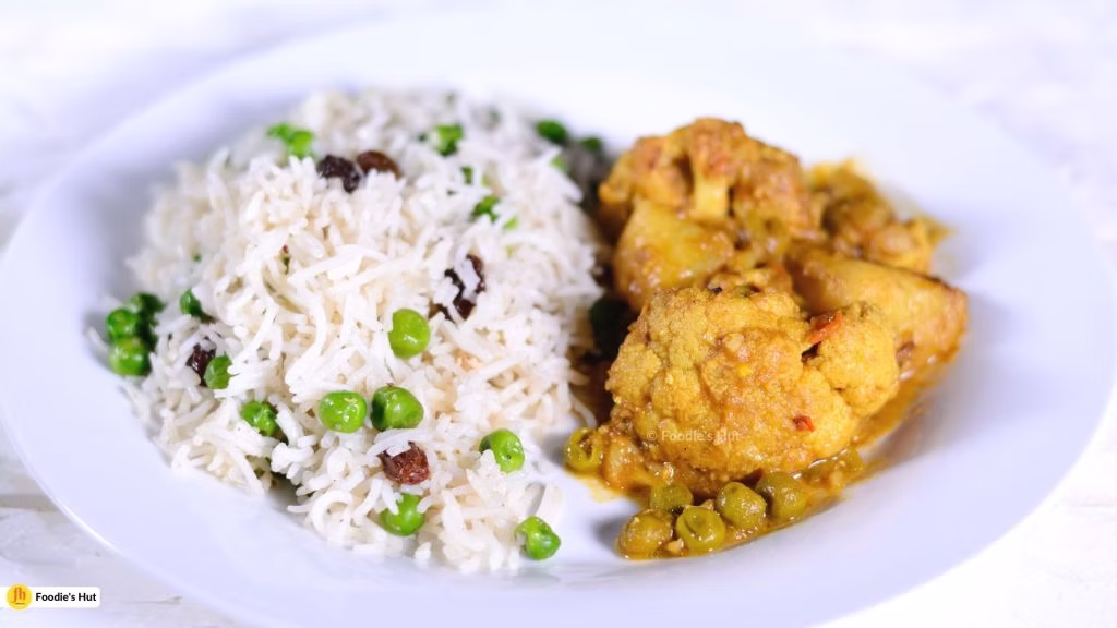 Aloo Phulkopir Rasa in a meal