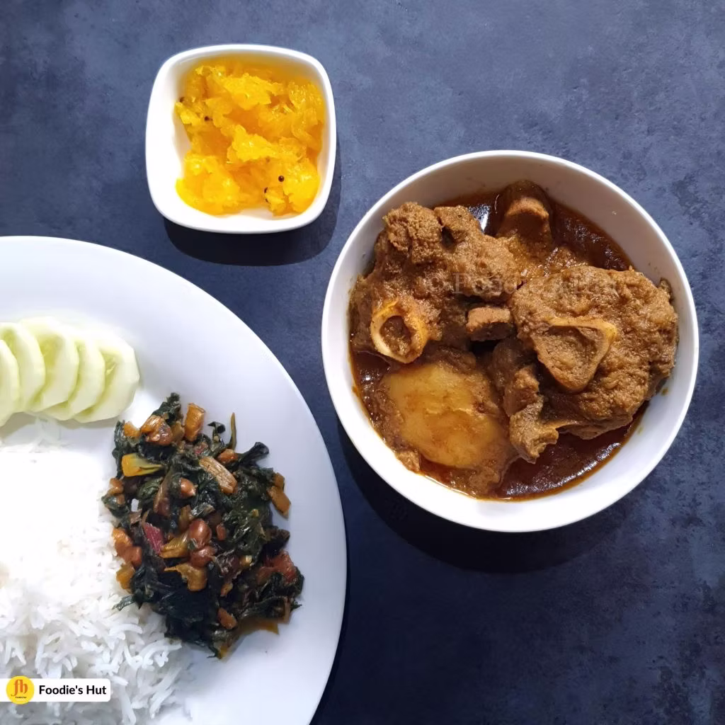 Robibarer Mangsher Jhol with Shak bhaja and Anarosher Chutney