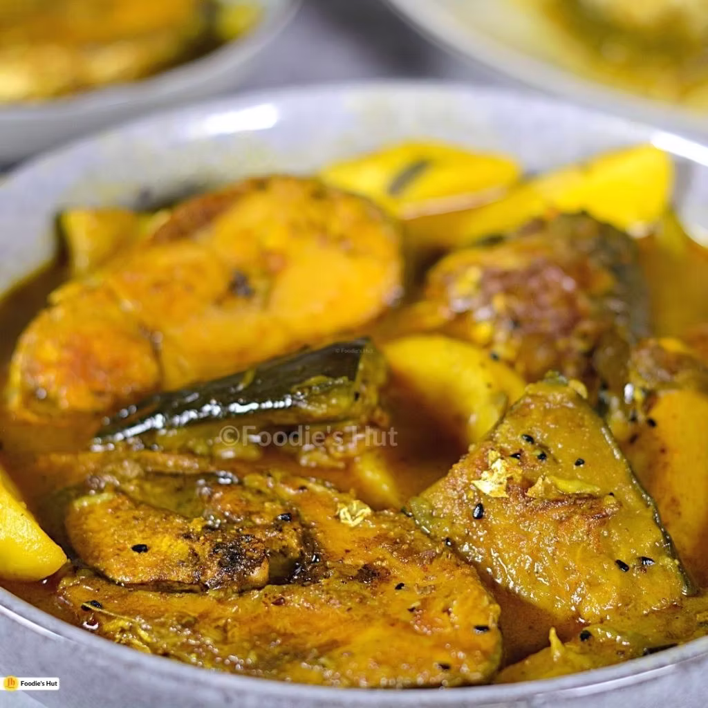 Ilish Macher Jhol Alu Begun Diye 